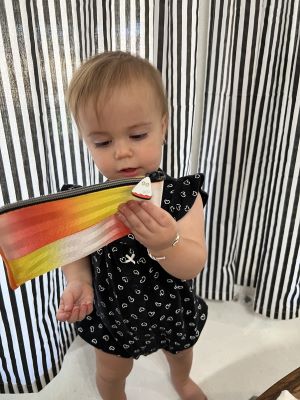 child holding coin purse