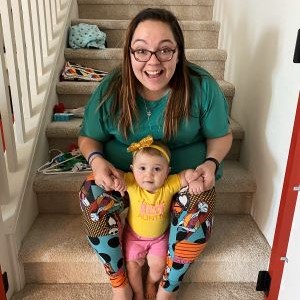 My niece and I sitting on the stairs. Click to access origin story page.